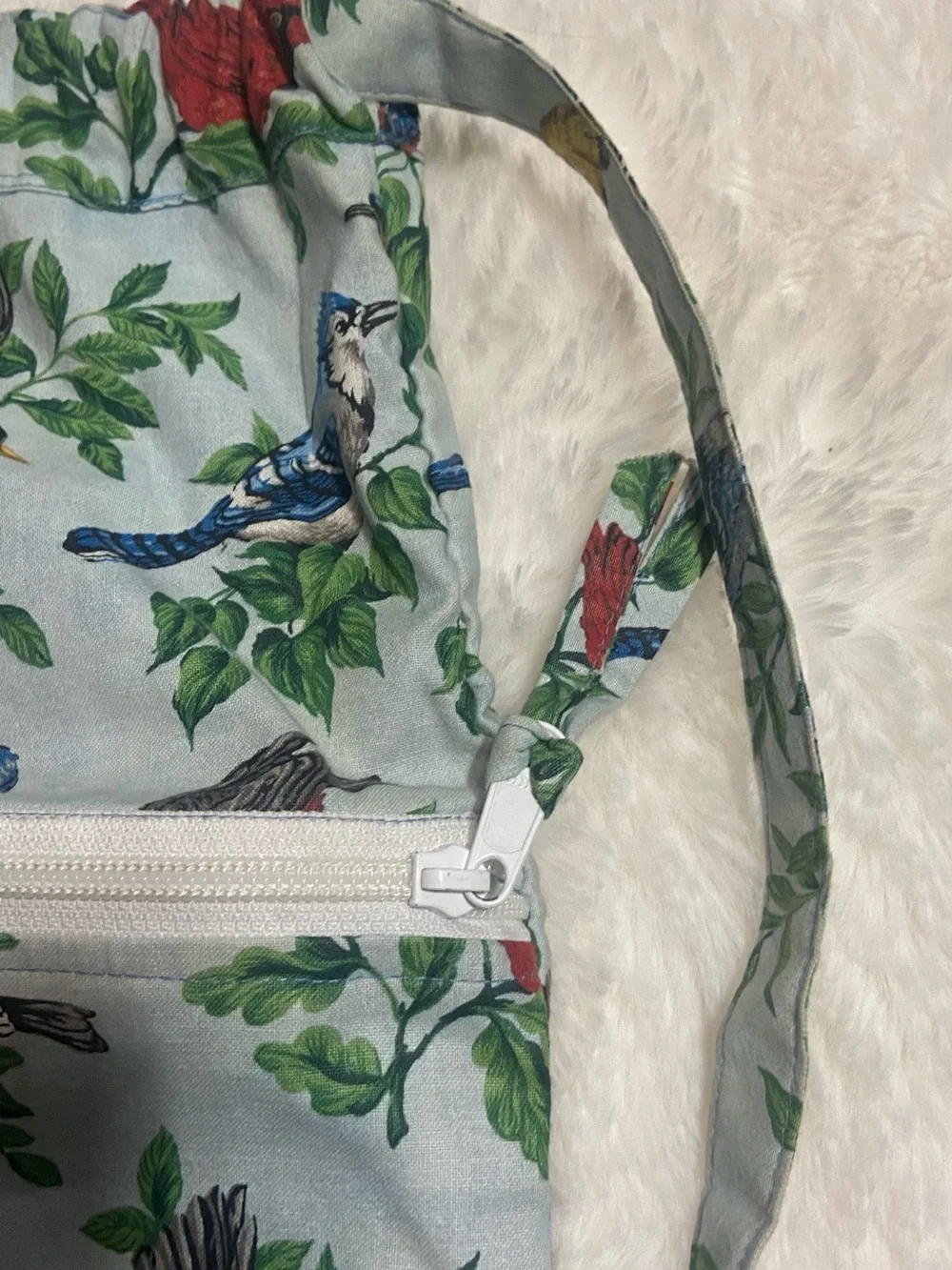 Stitches Bird-Print Drawstring Pouch in Blue, Green, Red, Yellow
